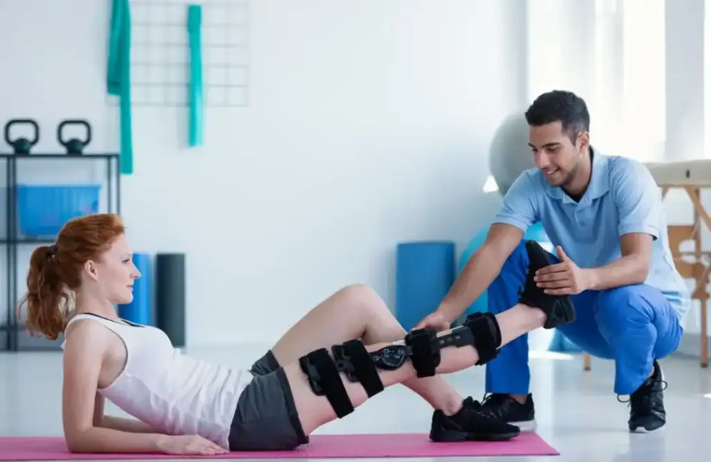 Debunking Meal Timing Myths: The Truth About Muscle Recovery 1 Woman having treatment to help muscle recovery Greenock after an injury