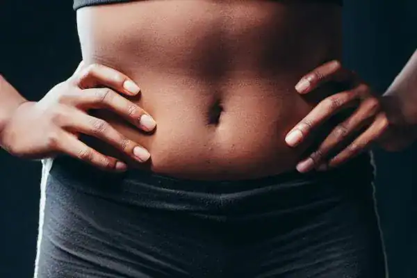 Toning Your Stomach: The Ultimate Guide to Achieving a Sculpted Stomach While Shedding Pounds 1 Image of a toned stomach after non surgical treatment Greenock